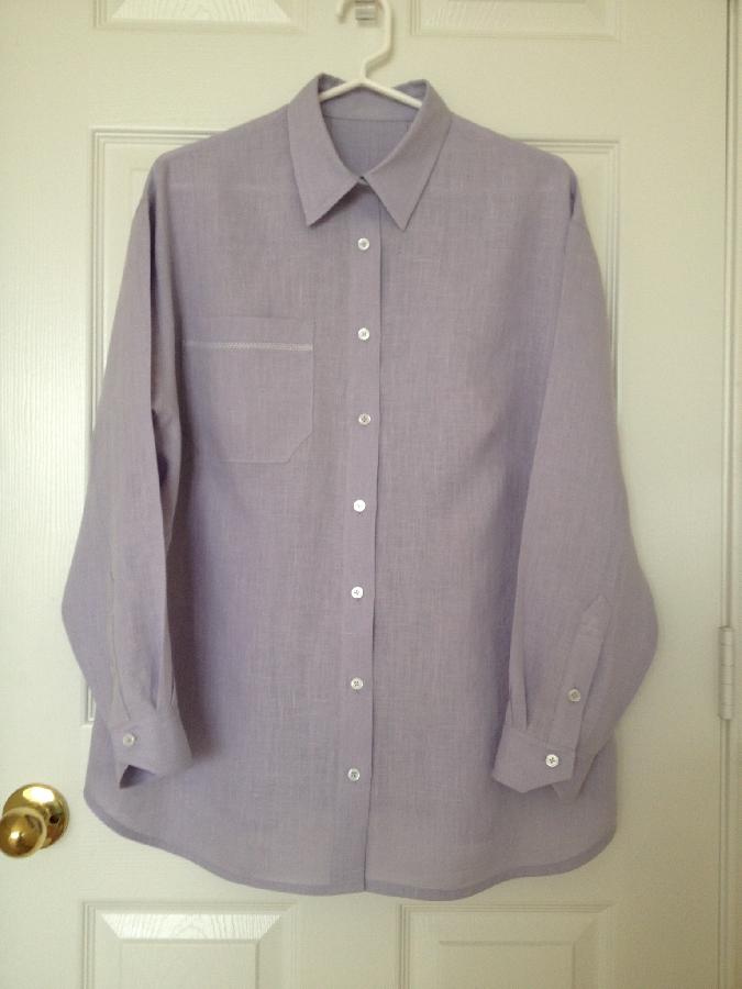 Penelope, Shirt made from silver lilac lightweight linen with hem stitch detail on the pocket and a deep pleat...