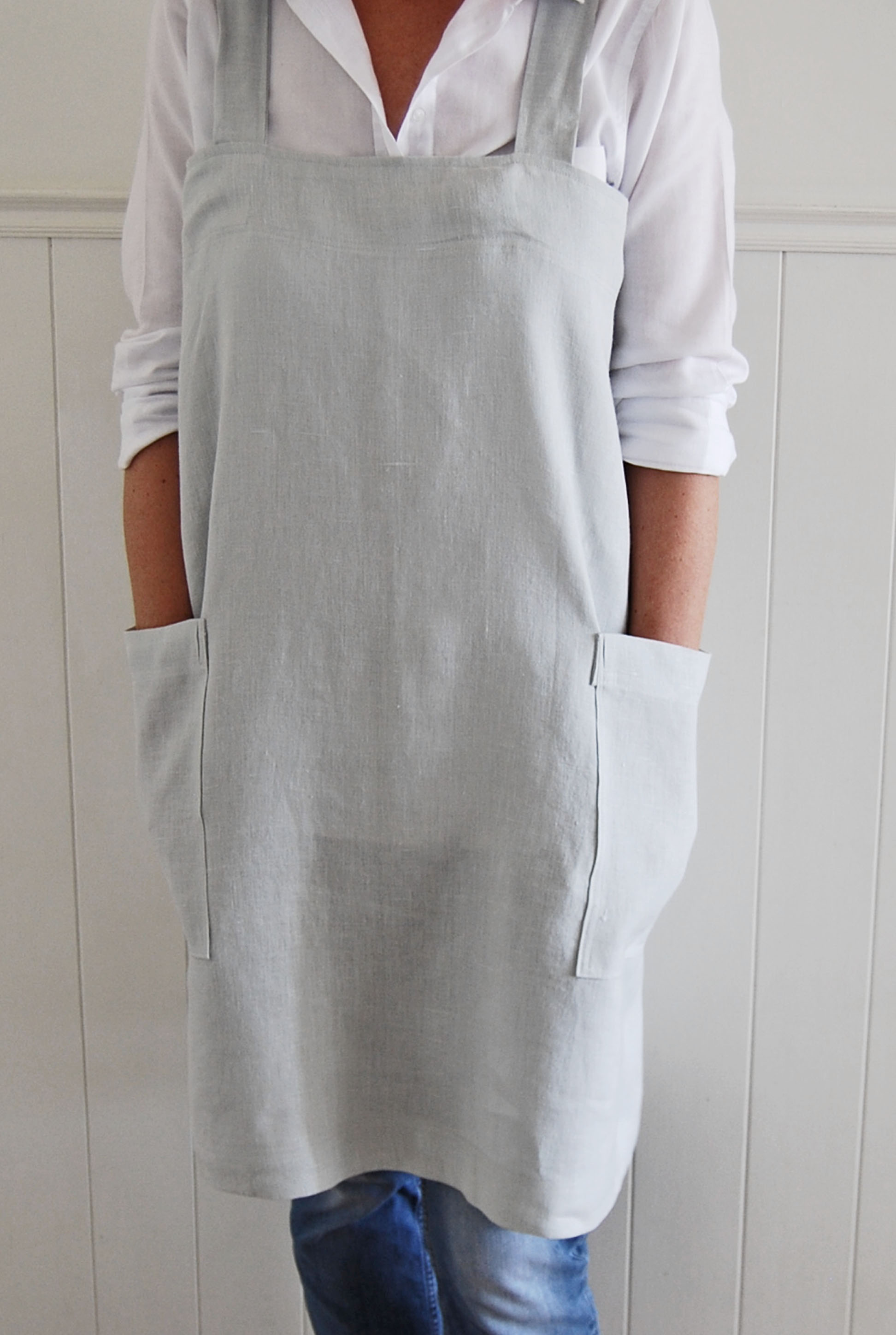 Angela, Cross back apron in softened dove linen. Available to buy at www.palegreyskies@etsy.com
