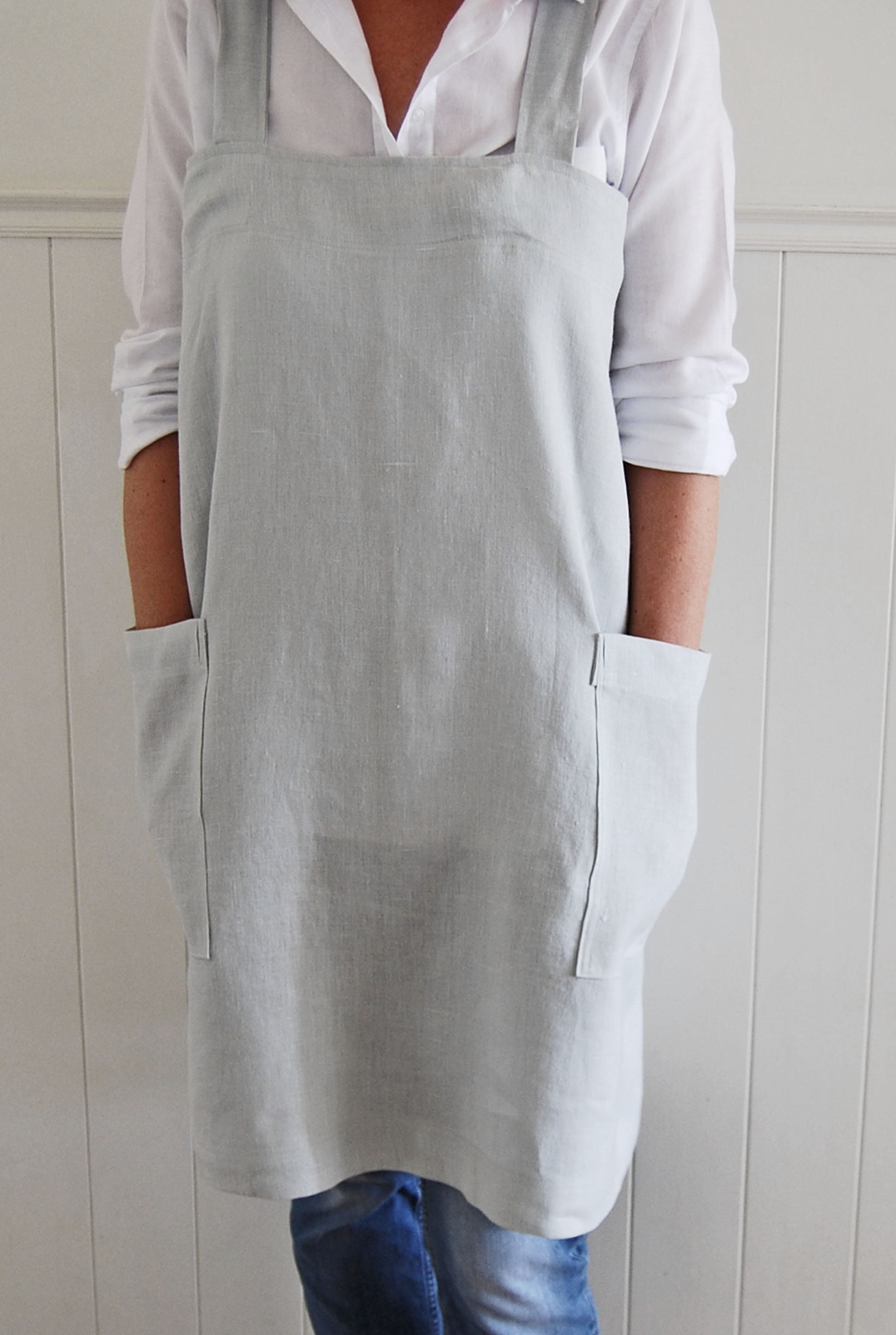 Angela, Cross back apron in softened dove linen. Available to buy at www.palegreyskies@etsy.com

