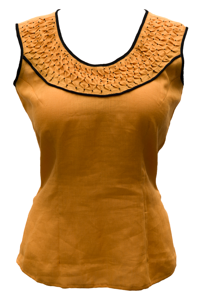 Janaki, I made this top (IL020 Autumn Gold softened) with hand-smocking on a bias strip in the yoke. To make...