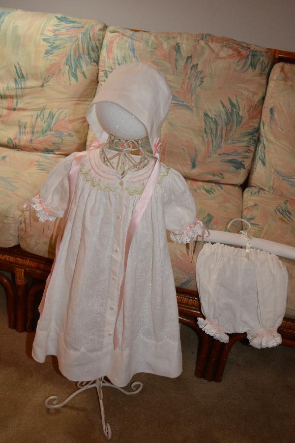 Melissa, Classic smocked bishop baby gown with scalloped pinstitched hem, with matching bonnet and knickers....