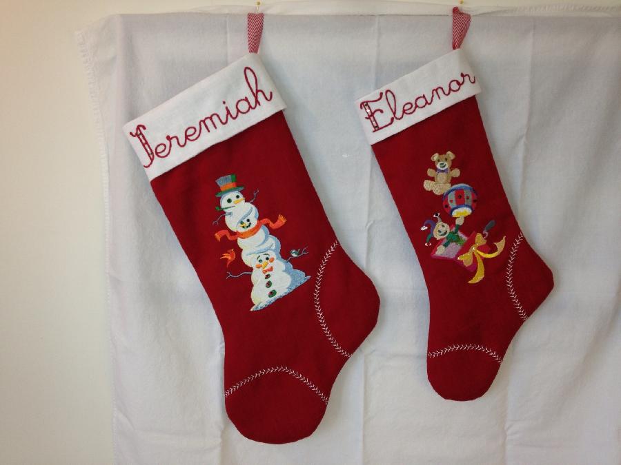 Cathy, Christmas stockings made with crimson red and optic white. Machine embroidered and added crystals, f...