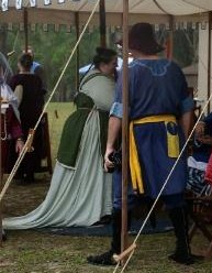 Miriam, Me in a norse style dark green apron dress. The green apron is 7 oz linen edged with hemp braiding....