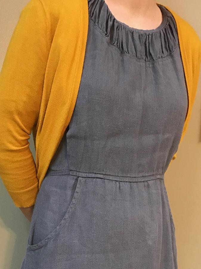 Cherlyn, I love my linen dress with ruffled neckline and slanted pockets!!! #everydaywear 