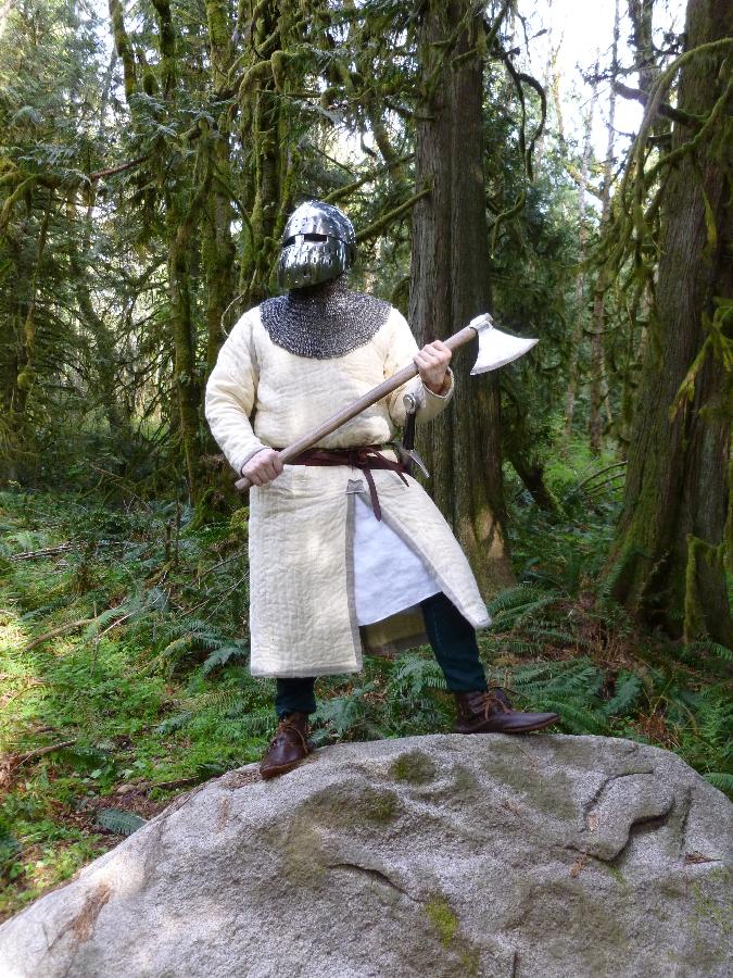 C storme, The axe-man cometh!

Gambeson, under tunic, braies (not visible), arming cap (not visible), and li...