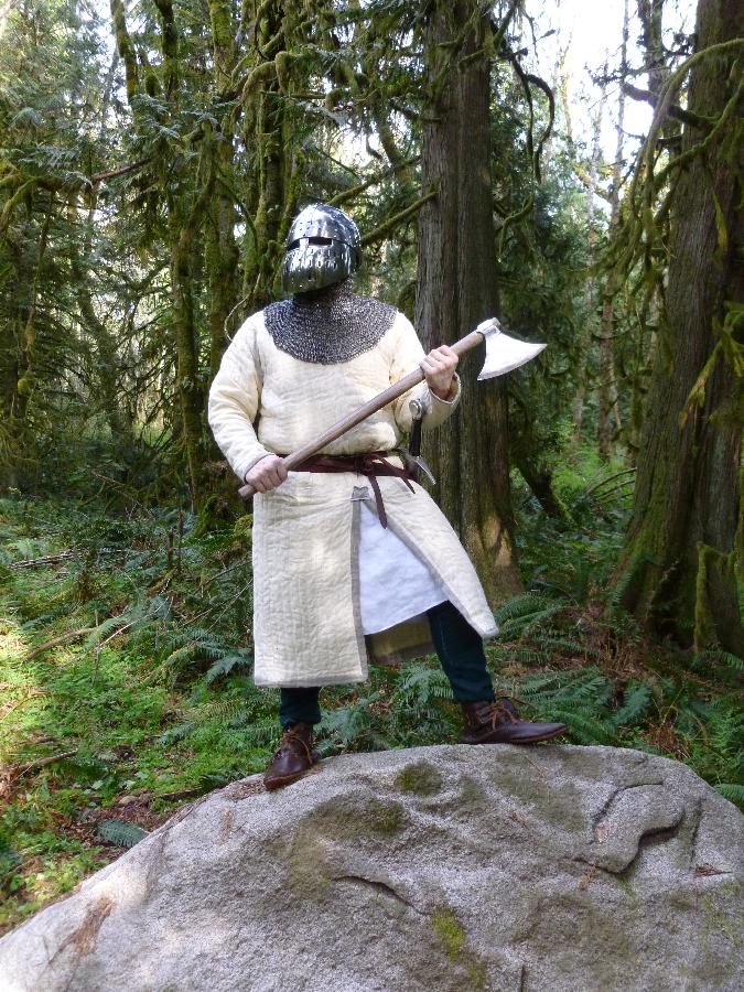 C storme, The axe-man cometh!

Gambeson, under tunic, braies (not visible), arming cap (not visible), and li...