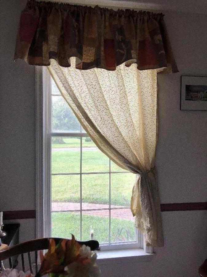 Carol, I made our dining room valance out of a 2 yard remnant I got at AC Moore. The curtain is decorator f...