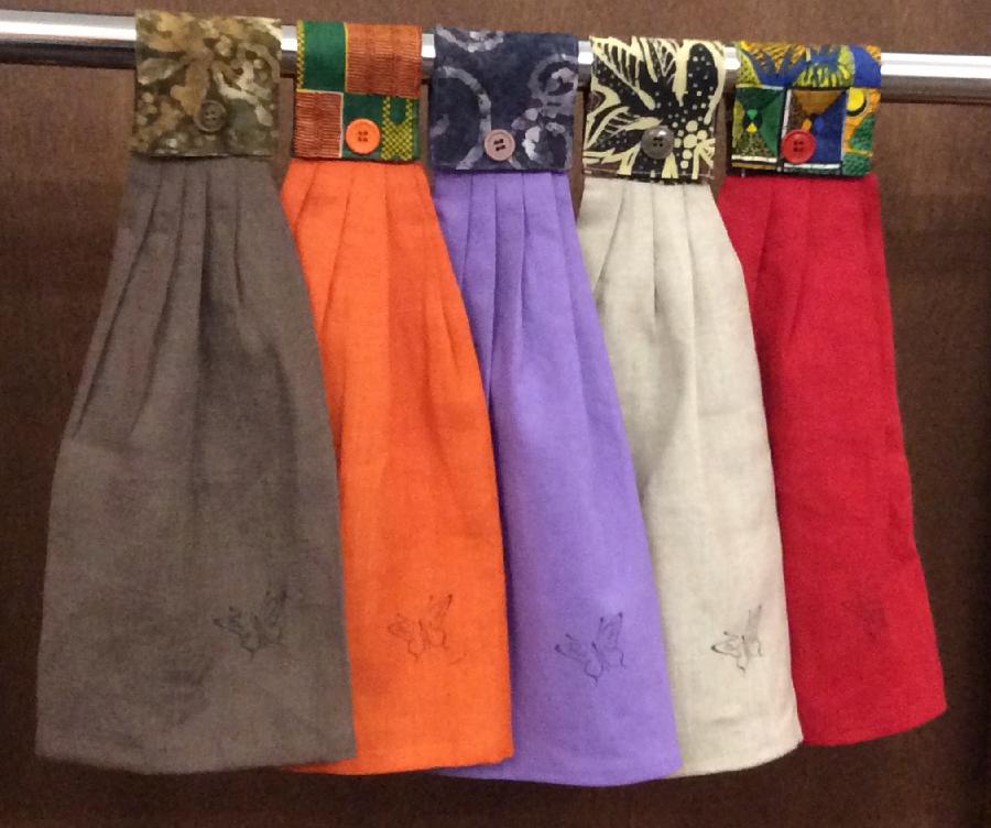 Jacqueline, Linen hand towels with assorted cotton print tabs.

Great gift ideas!

Potting soil, flame orang...
