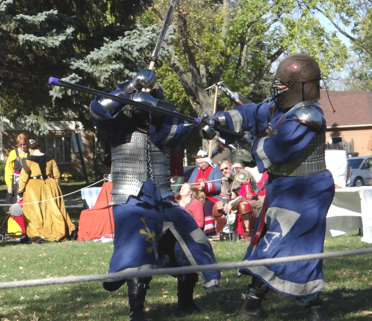 Regina, Our beautiful new linen fighting tunics in action at Northshields Fall Crown Tournament.