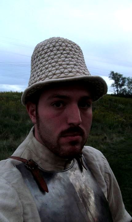 Daniel, A handsewn armored hat made in linen canvas and lined in more linen with over 300 steel plates stitc...