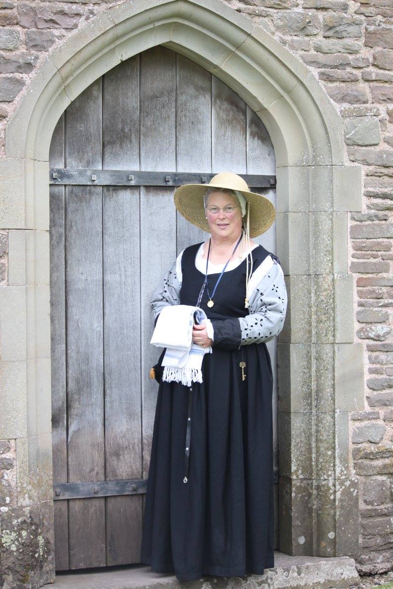 Susan, a 16th cent. Middle class Tudor outfit in Black wool, with wool and linen cutwork detatchable sleeve...