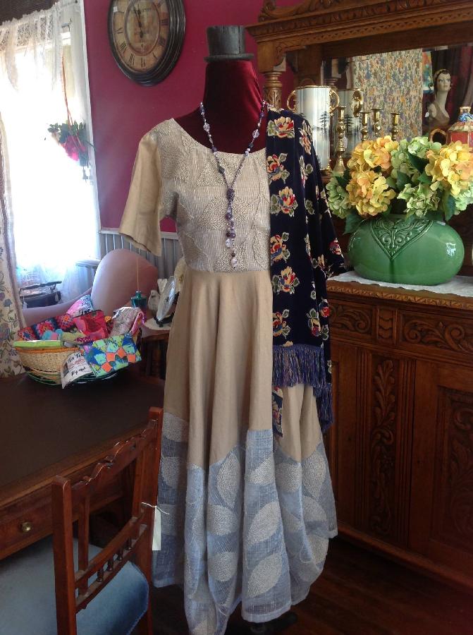 Sheila, Bias cut dress using linen fabric plus linen and polyester embroidered fabric.. The fabrics drape be...
