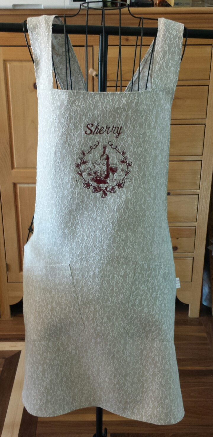 Linda, This apron was made from the floral twig linen, personalized with my clients design of choice and t...