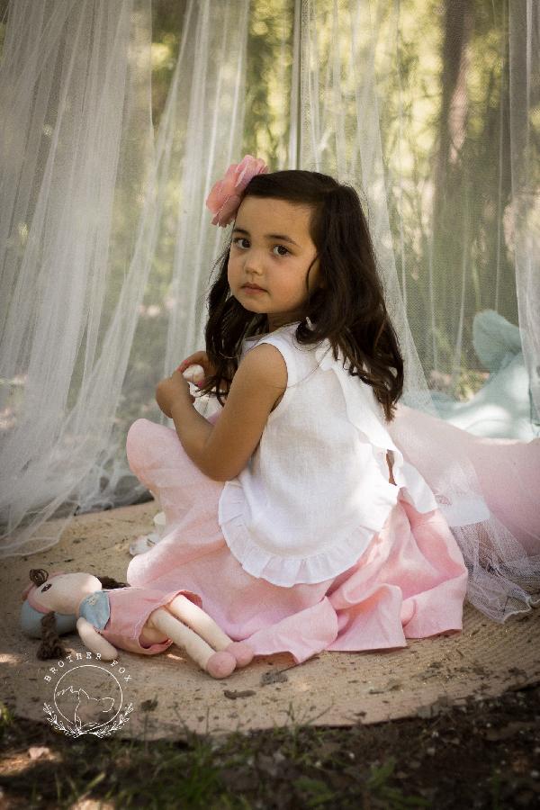 Gabrielle, girls party outfit in light pink and white linen
