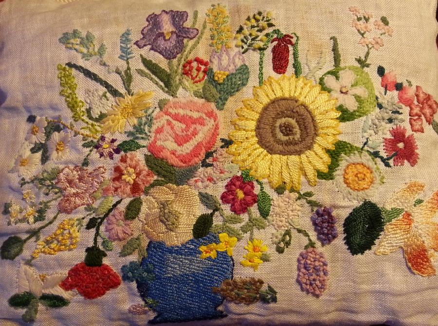 Eileen, I designed and embroidered this piece on linen fabric. It is a sampler which includes the state flow...