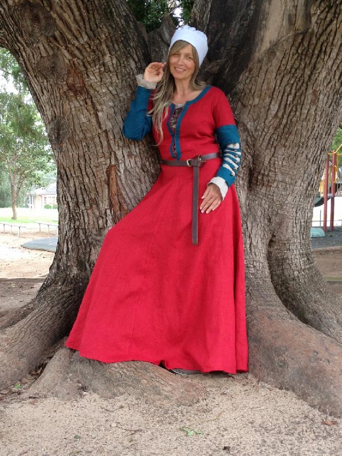 Andrea, A medieval dress. The chemise is made of natural handkerchief linen and the dress in crimson with sp...
