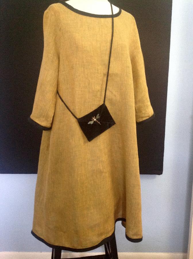 Susan k, Pullover flared dress of yarn dyed linen bound in black linen improvised from NEW LOOK SO443 pattern...