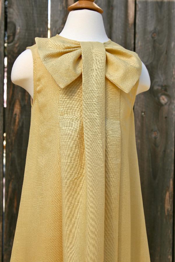 Samuelle, Hi, this is my big bow,  100% pure linen dress. I created this dress for one of my clients who was p...