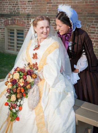 Elizabeth, Wedding dress on left, brown wool on right