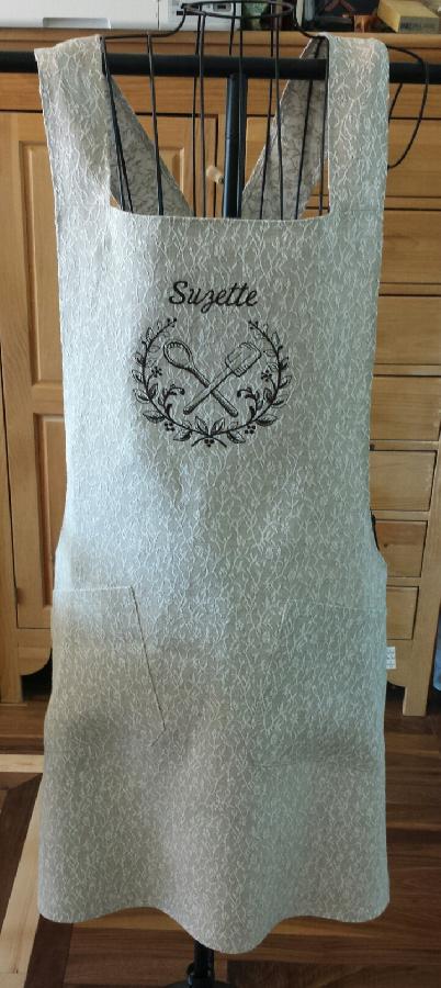Linda, This apron was made from the floral twig linen, personalized with my clients design of choice and t...