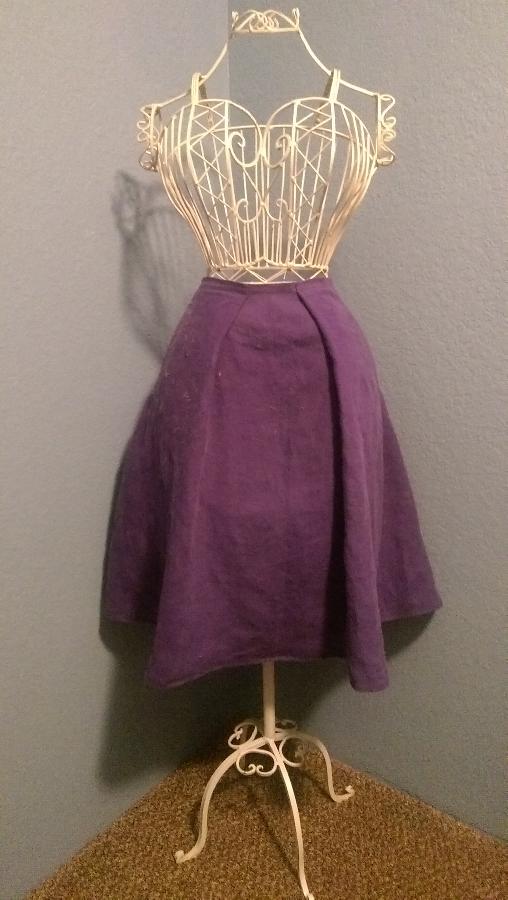 Lina, Simple pleated skirt made from medium weight royal purple. Hits just below the knee with a flatterin...