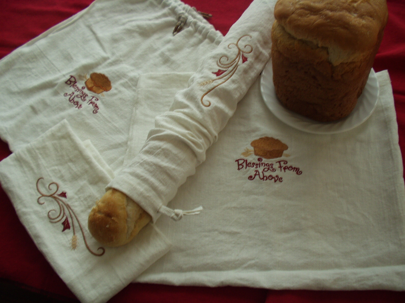 Orrilla, These embroidered linen bread bags are created of Krista colored IL019, which keeps fresh loaves wel...