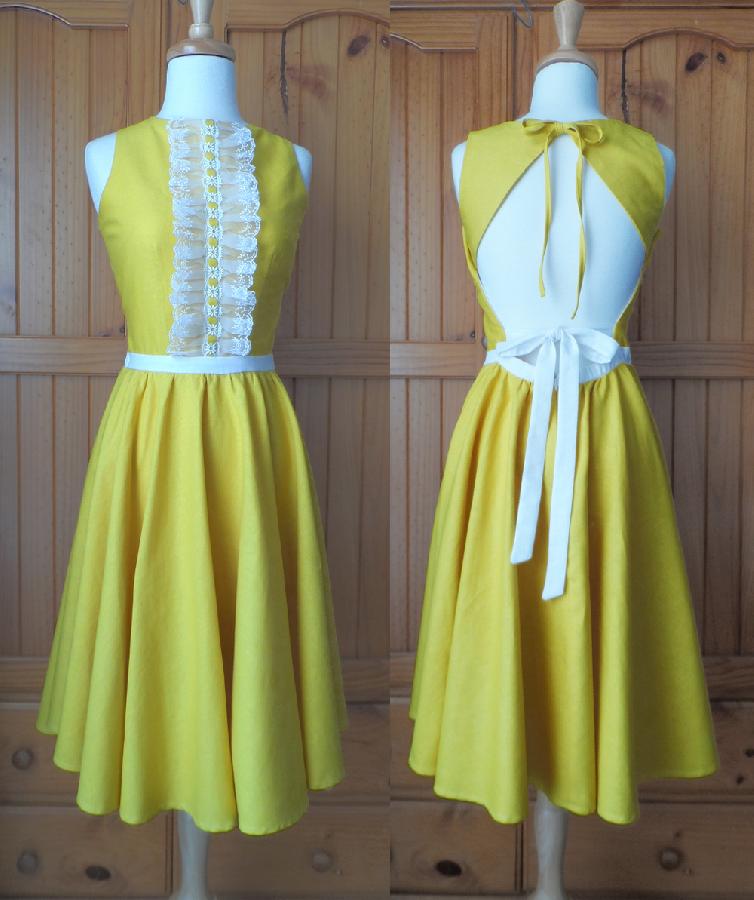 Shayne, The Turmeric Dress is made of mid-weight, unbleached linen which I dyed to an intense shade of turme...