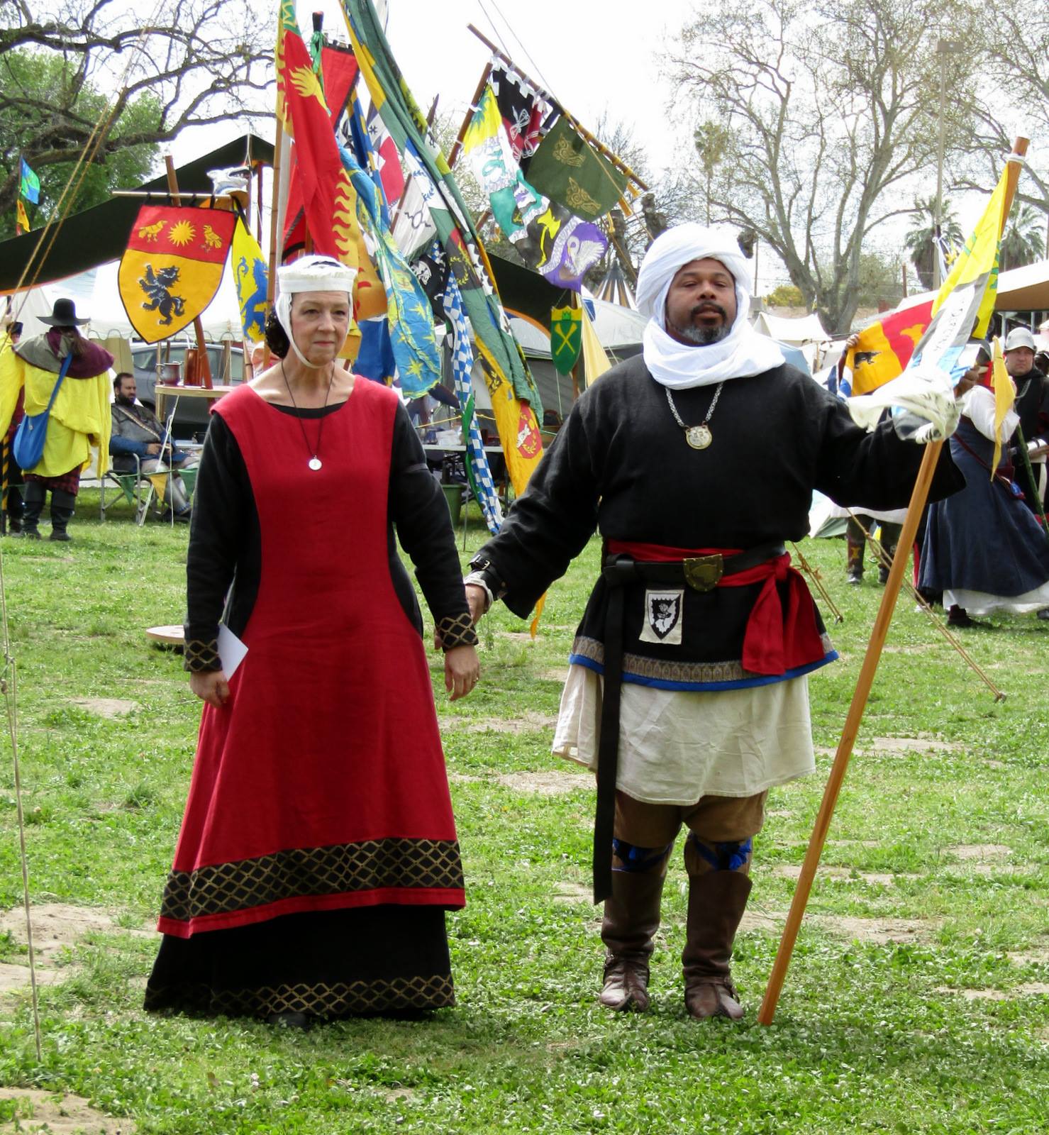 Maureen, 13th Century re-creation clothing: Moira is wearing a sideless surcoat of IL019 Crimson over a dress...