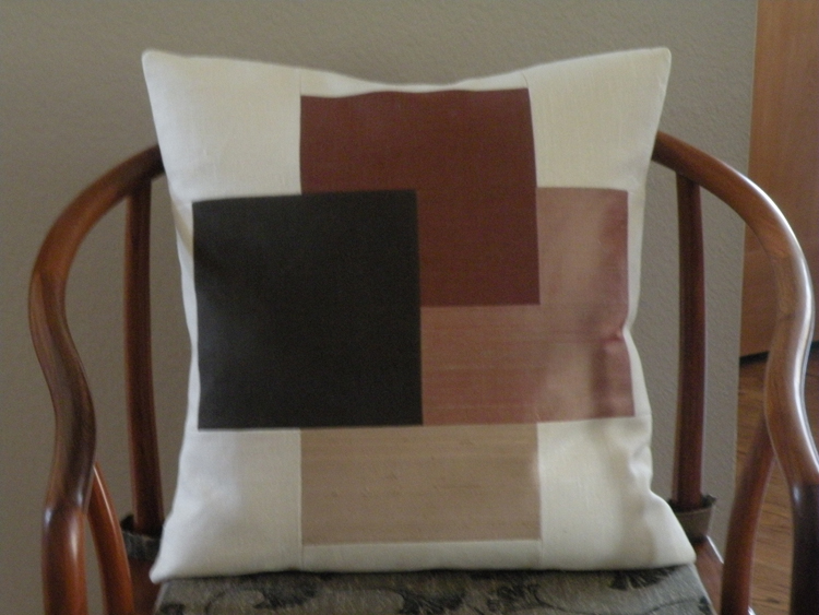 Martha, This 20 x 20 pillow holds two squares of linen in colors Teak and Kenya, and two squares of Dupion...