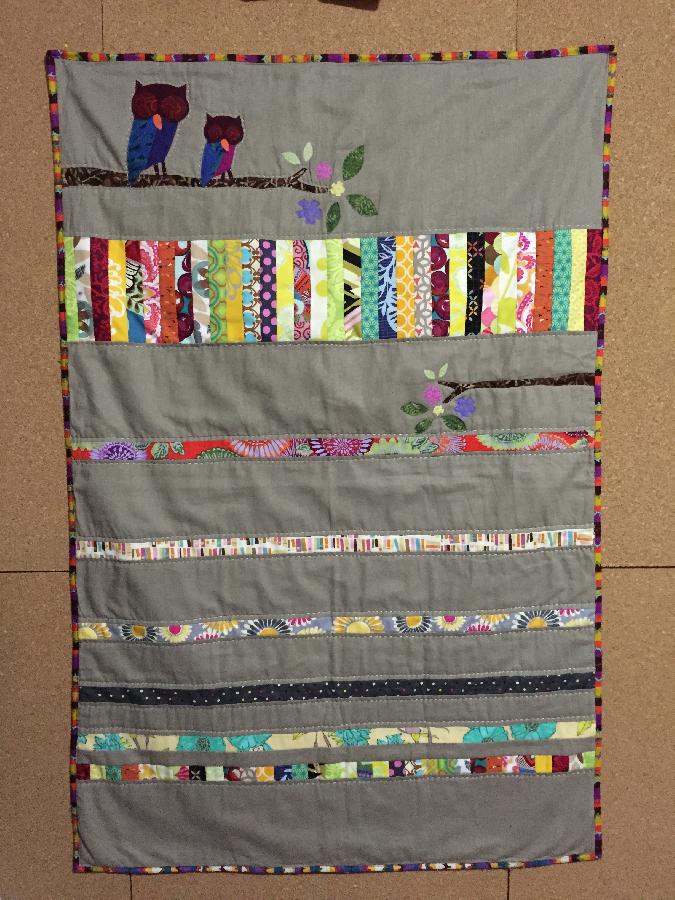 Brigette, This is a baby quilt made with medium weight linen.  It is my own design and I also used scraps from...