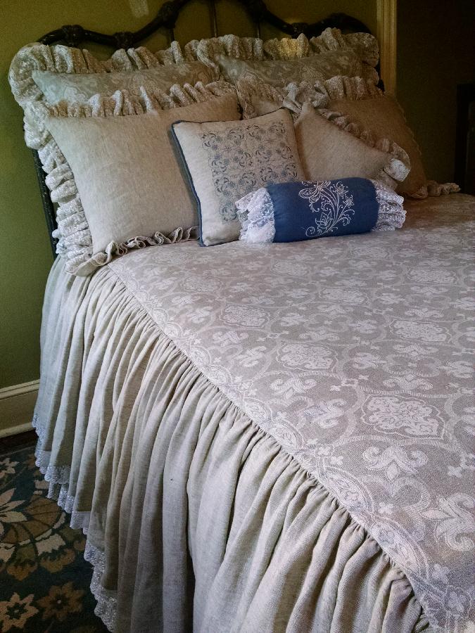 Rachel, Skirted coverlet bedding set, made entirely of linen, with lace accents and embroidery. The coverlet...