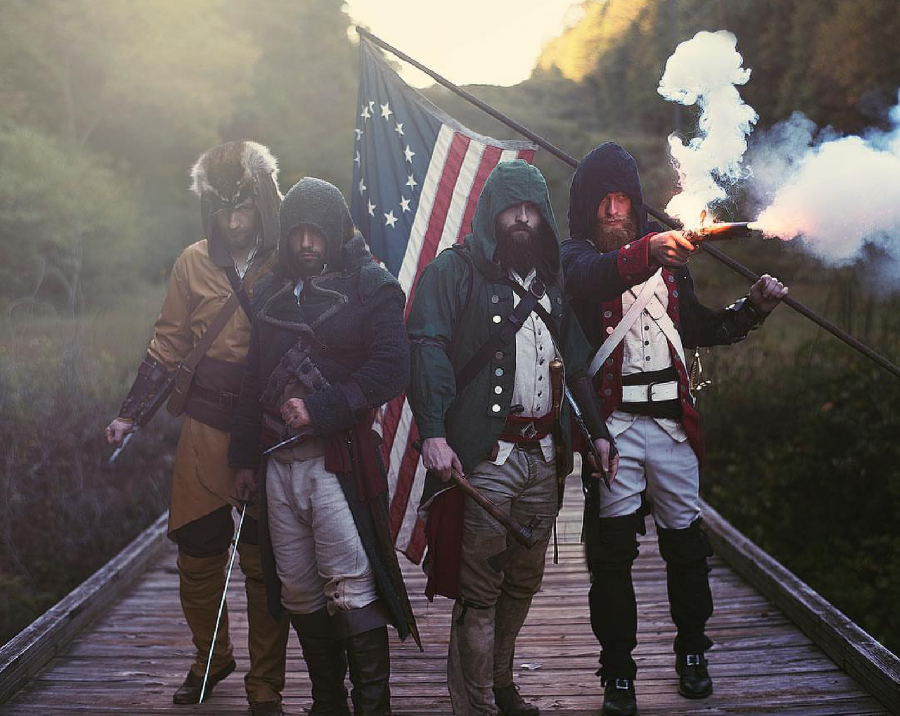 William, I am the Revolutionary War patriot on the right, holding the flag. My coat is handmade by myself and...