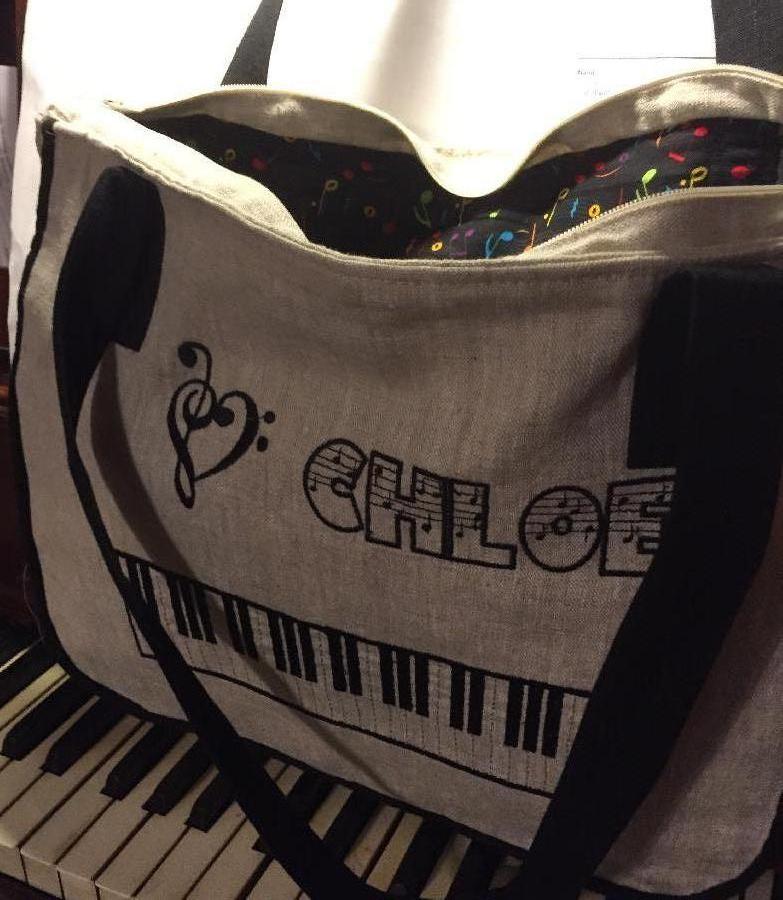 Theresa, PIANO BAG  made with natural and black linen, lined with music note print cotton.
