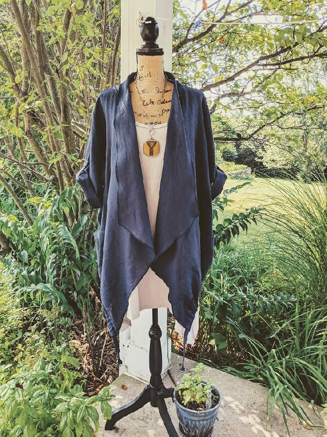 Jane, SunRagsStudio
Unique waterfall jacket with rolled tabbed sleeves, side pockets and drawstring hem u...