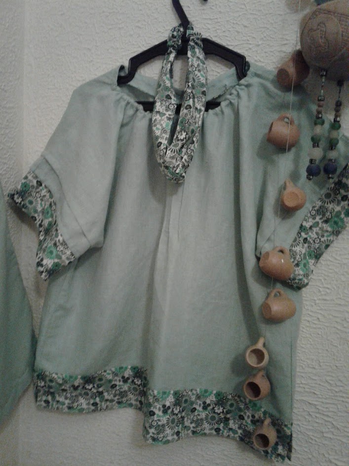 Claudia, Summer blouse in frosty green and flowers in cotton.