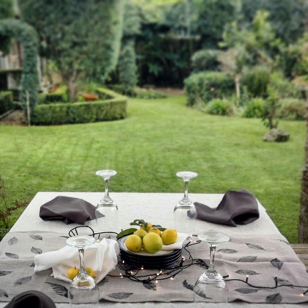 Angela, Mix natural, heavyweight linen tablecloth with table runner in natural, hand printed with feathers/l...