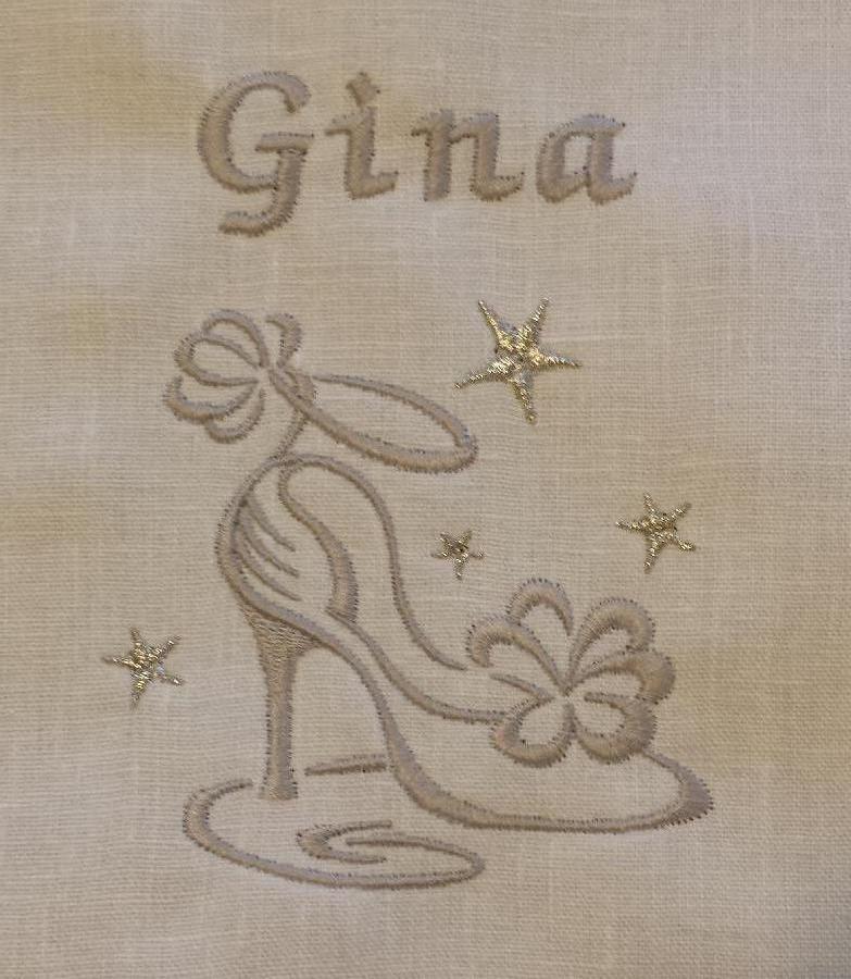 Linda, IL019 linen in softened, Optic White was used to make personalized shoe bags, destined to be a brida...