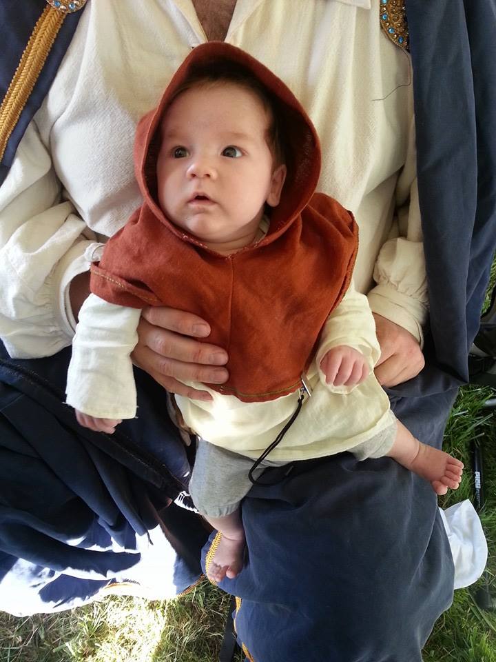 Whitney, I created a baby tunic and a baby liripipe hood out of linen. The tunic is IL020 natural and the hoo...