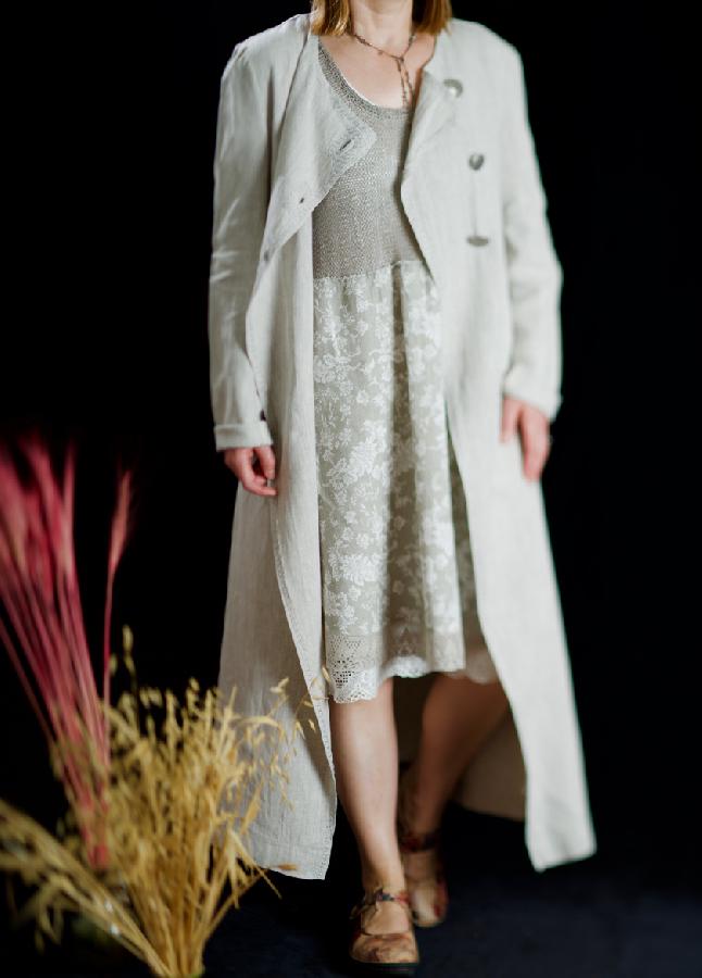 Maria, 100% linen :)
Top part of the dress is knitted out of linen yarn, floral bodys hem is embellished...