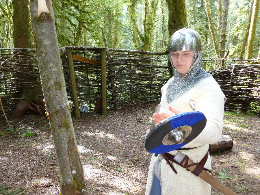 Patrick, A knight inspecting his blade.