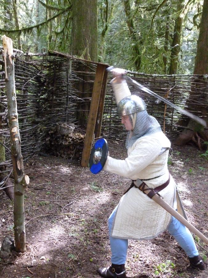 Patrick, Man-at-Arms practicing at the pel.
Quilted linen gambeson, braies, arming cap, and lining to hose al...