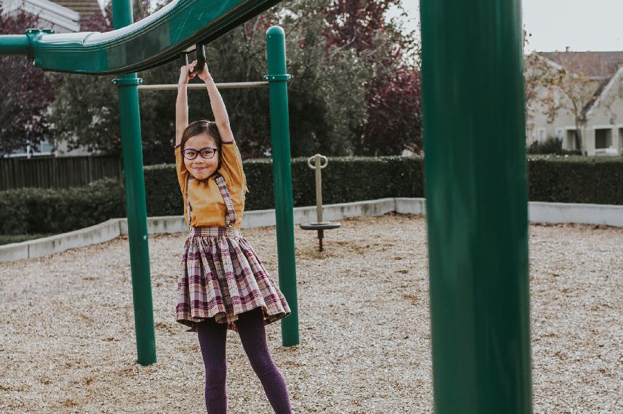 Czarina, Mustard linen top and a plaid suspender skirt