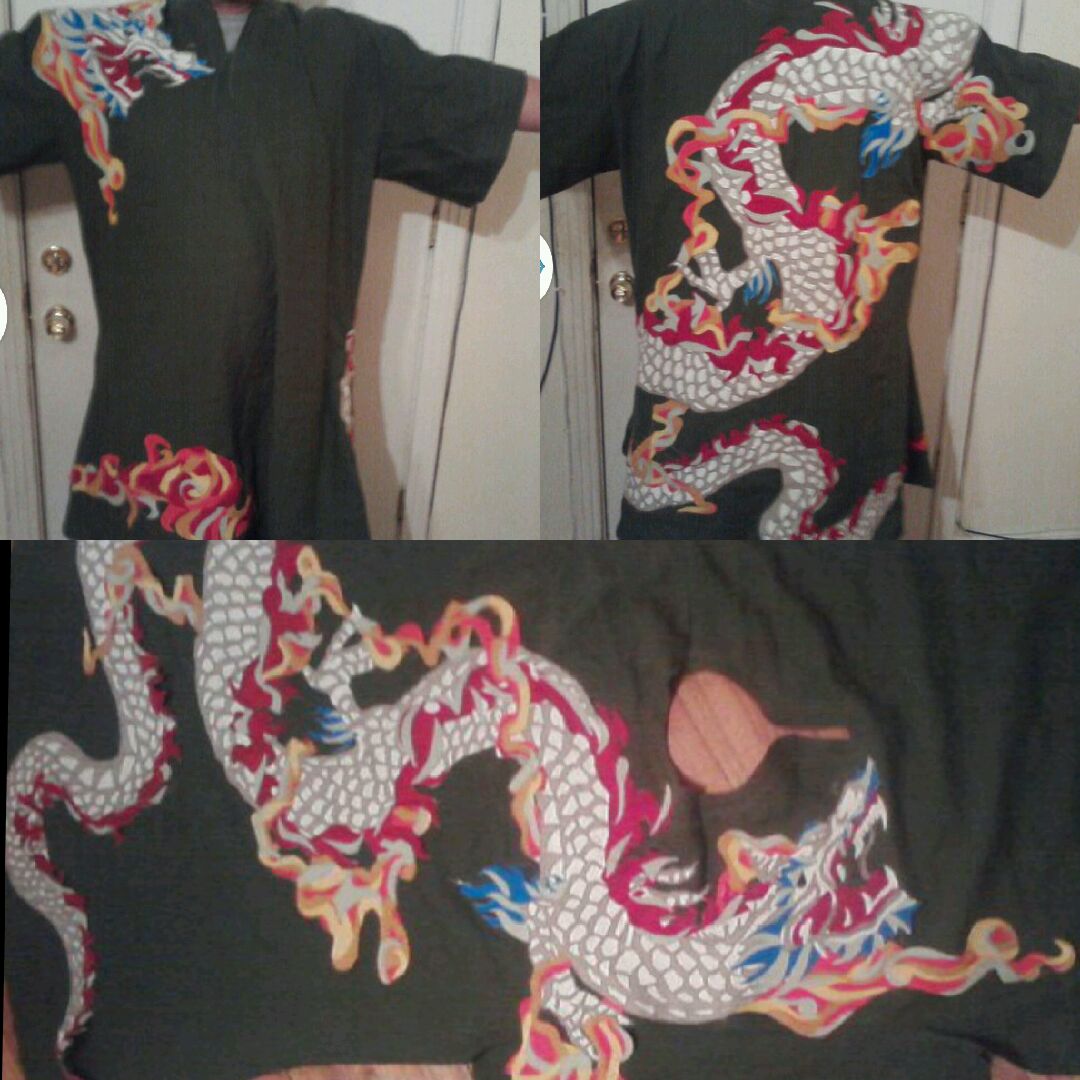 Cara, This is a tunic I made for the larp amtgard.  The dragon wraps around most of the tunic. All materia...