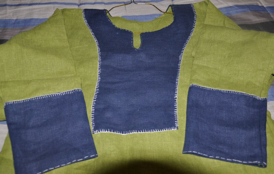 Judi, Viking outer tunic.  Made with Green 100% linen and Cobalt Blue 100% linen.  Top stitching is done i...