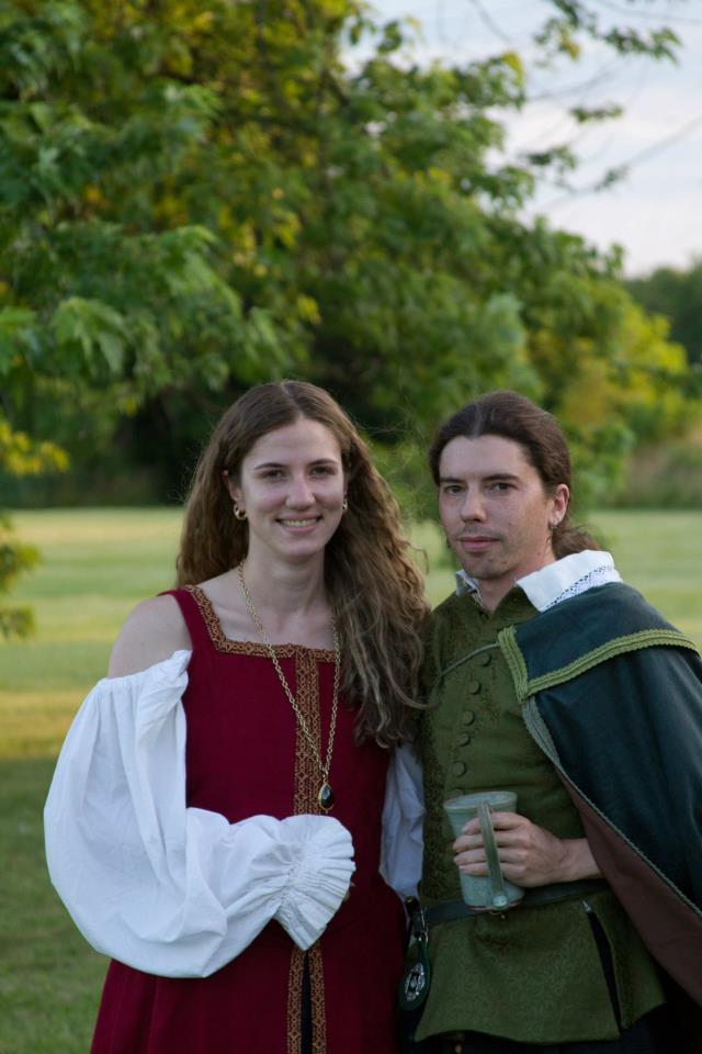 Elena, Finally got the trim on my dress for this pic! And my husband showing off his cape! Which you cant...