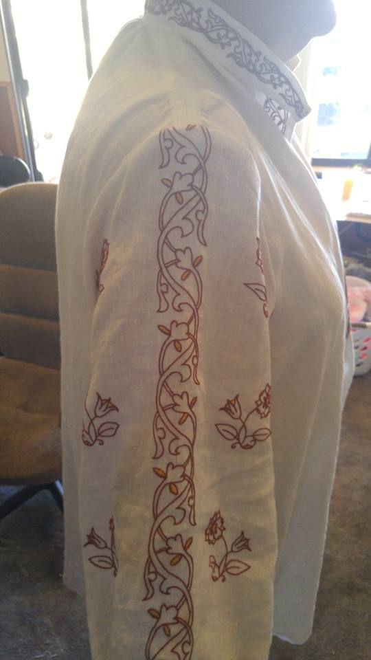 Kari, Side view of the chemise.  Each arm has 3 twining  and 2 rows of flowers