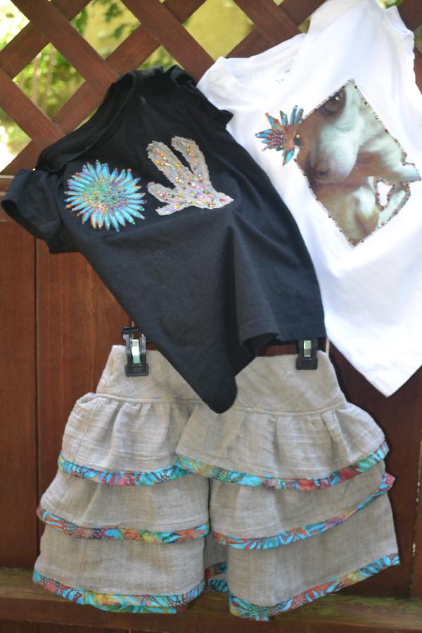 Shirley, Girls size 4 three tiered linen skirt trimmed in batik bias tape with t shirts.  The black shirt ha...