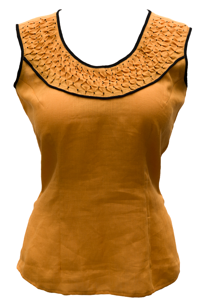 Janaki, I made this top (IL020 Autumn Gold softened) and did smocking in the yoke. To make it more interesti...