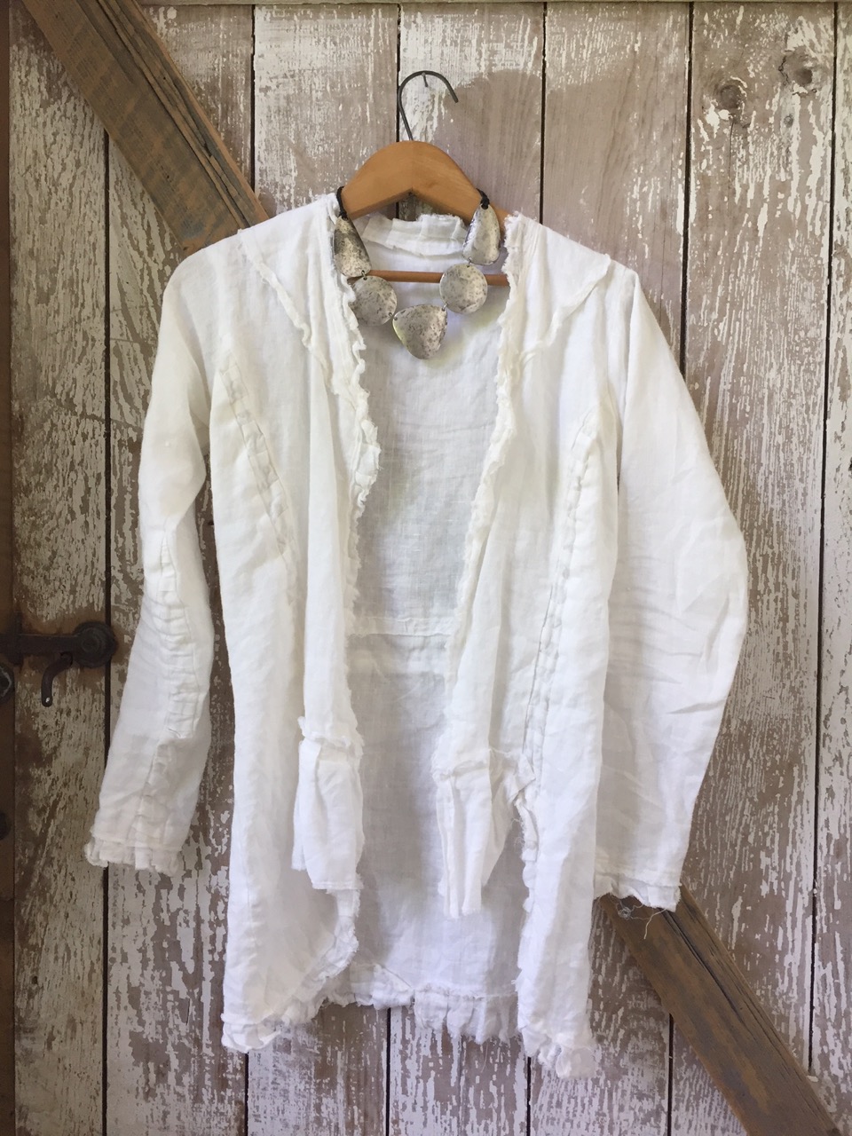 Anita, Optic white linen jacket, medium weight on body and light weight on ruffles.