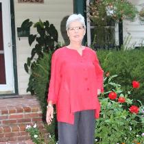 Red Linen Top with Gray Linen Capri Pants:  Shirt buttons down the front and capri pants sport a...